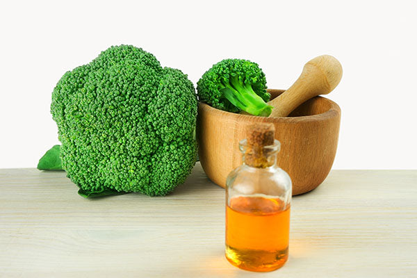 image of high shine hair oil containing broccoli seed oil