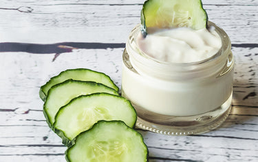 Image of lifting eye gel in a jar with cucumber slices