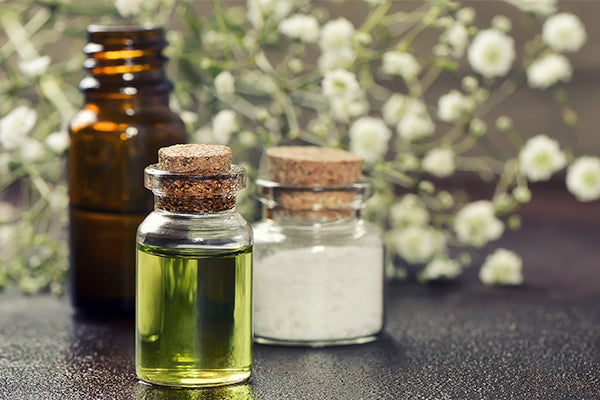 image of bottles containing massage oil blend