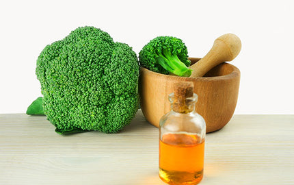 image of high shine hair oil containing broccoli seed oil