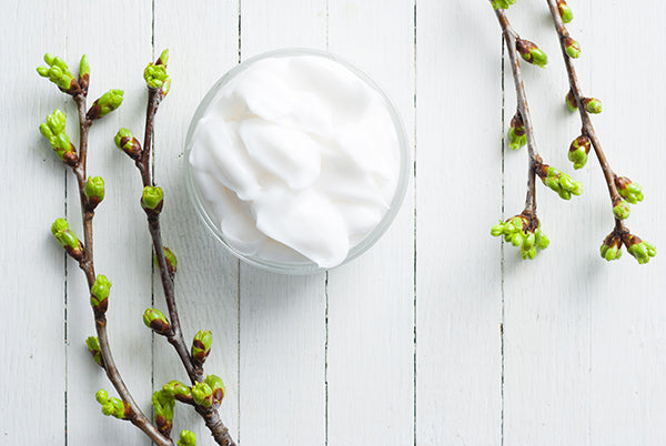 Image of a jar containing lightly lifting body lotion