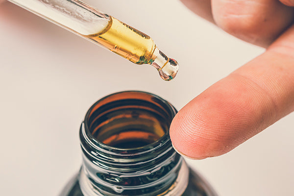 image of face serum in a pipette