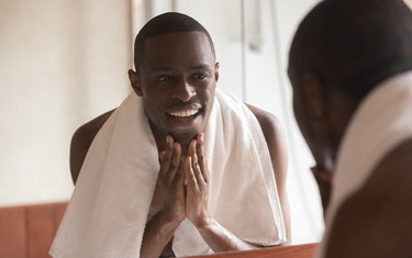 guy looking into the mirror