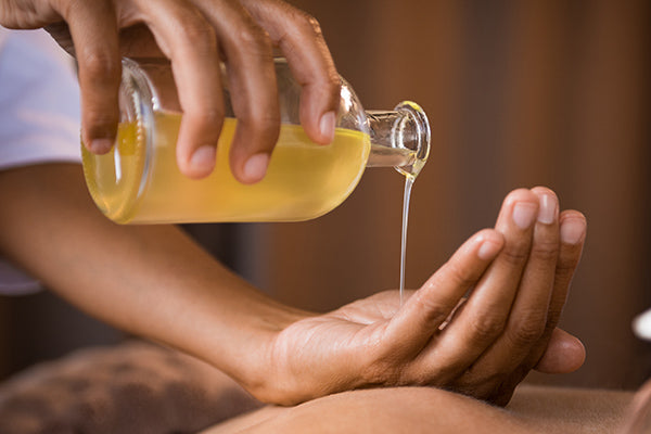 image of massage oil after sports being applied